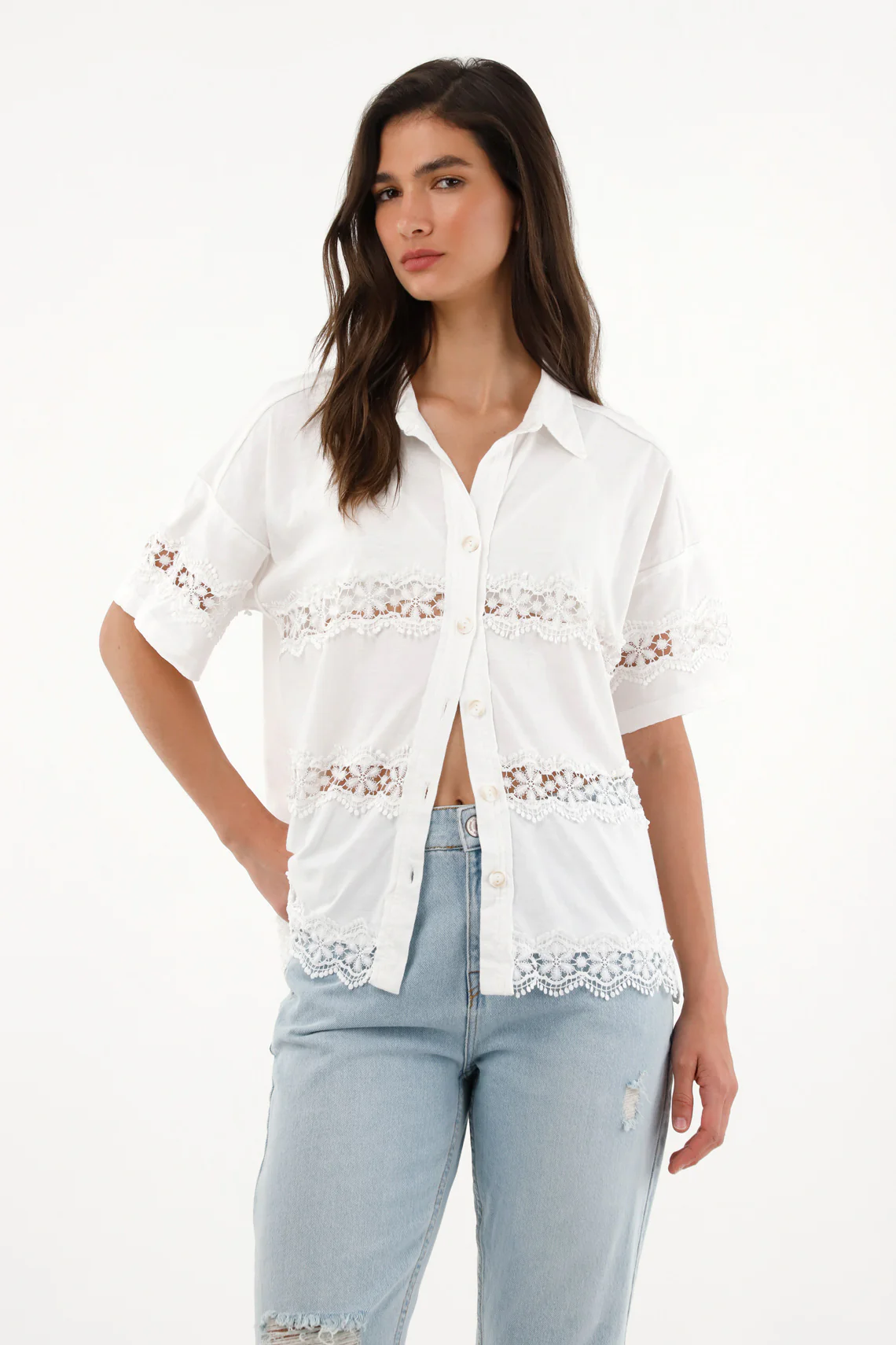 Women's short sleeve shirt with decorative cutouts. - Image 2