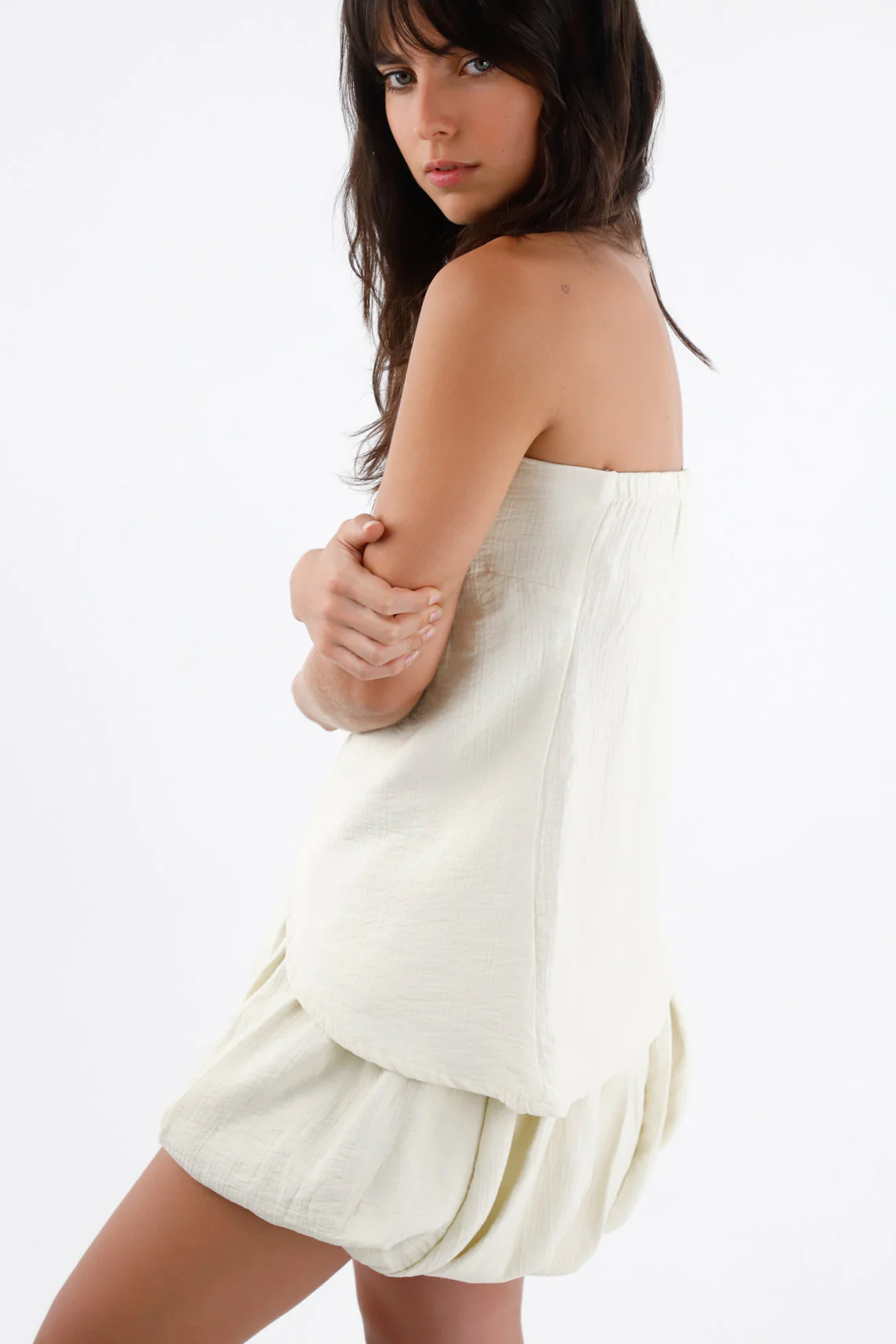 Ivory Strapless Top for Women in Lightweight Fabric with Asymmetrical Hem - Image 3